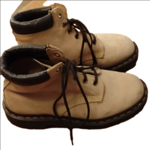 Doc Marten tan boots. I can't find size, please see measurement. Couple spots.